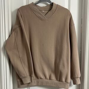 Tan Crew Neck Sweater with Ribbed Cuffs and Relaxed Fit